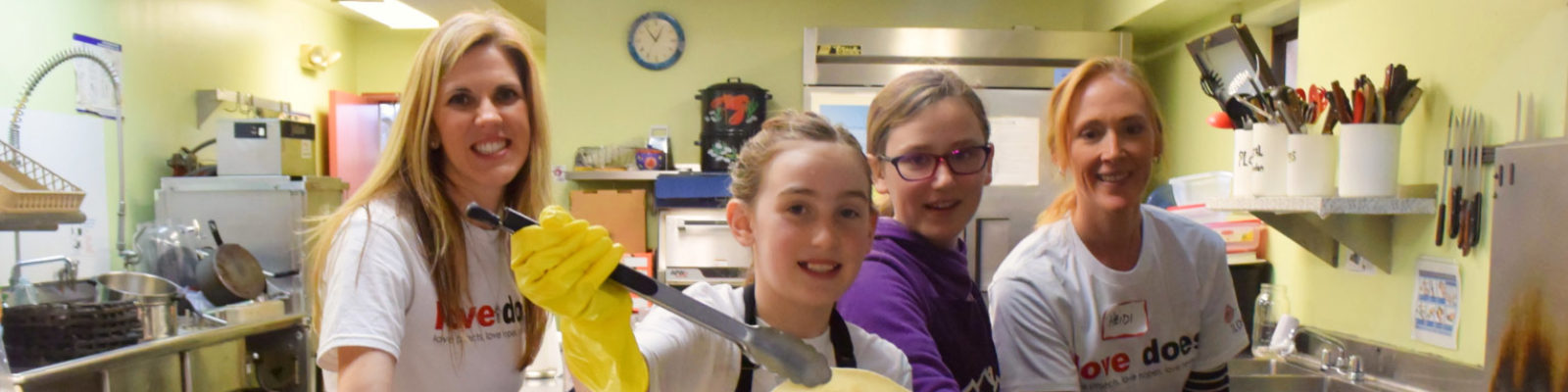 volunteers serving dinner